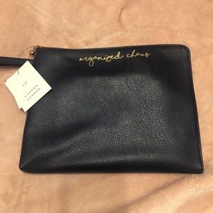Brand new navy clutch by Lauren Conrad